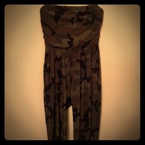 Camouflage halter jumpsuit stops at calf.